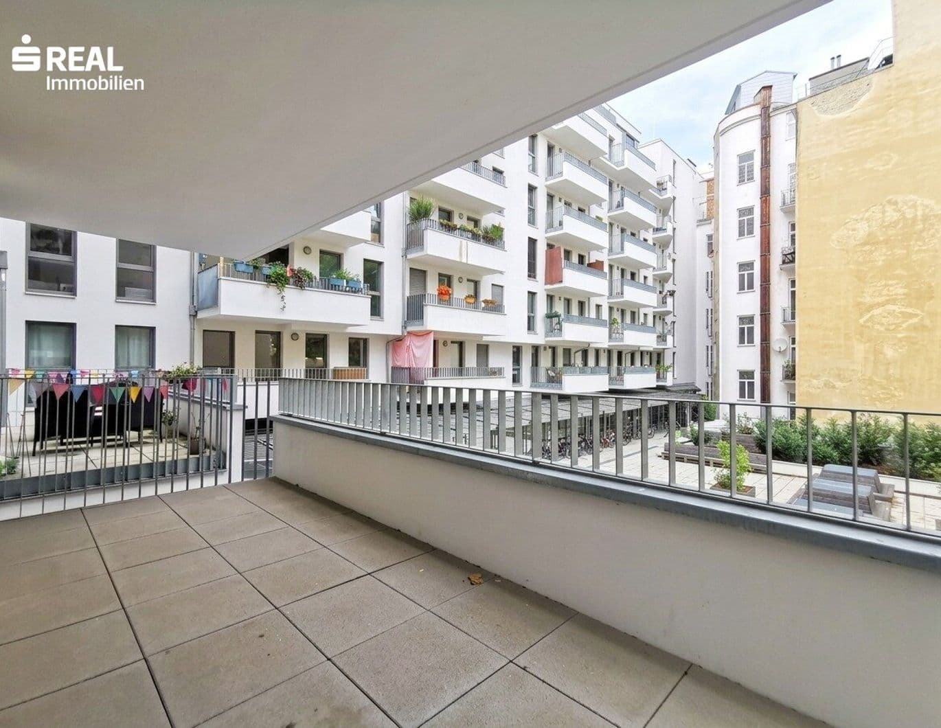 Hofseite Balkonwohnung in der Nußdorfer Straße